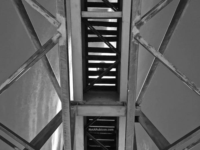 Jonathan Ross walking across the railroad bridge