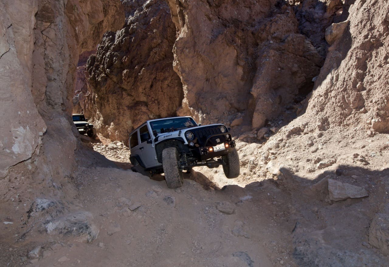 Jeep Wrangler on 3 wheels on Doran off-road trail near Calico