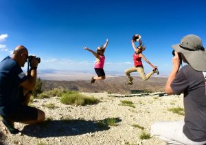 People jumping on Tip Top Mountain in Big Bear california